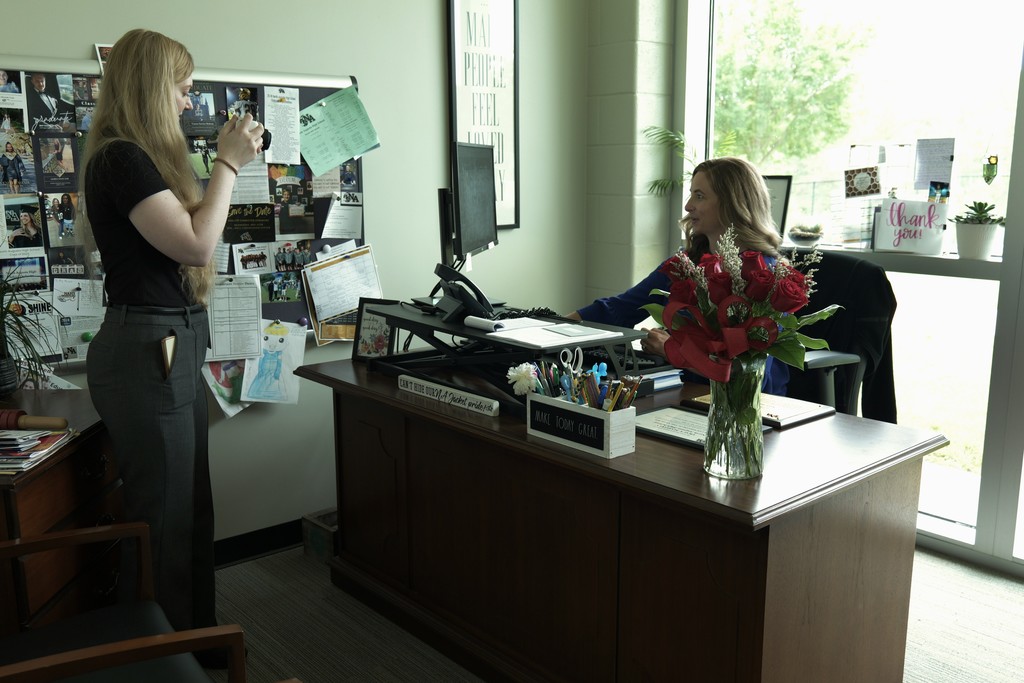 Tracy being filmed in her office.