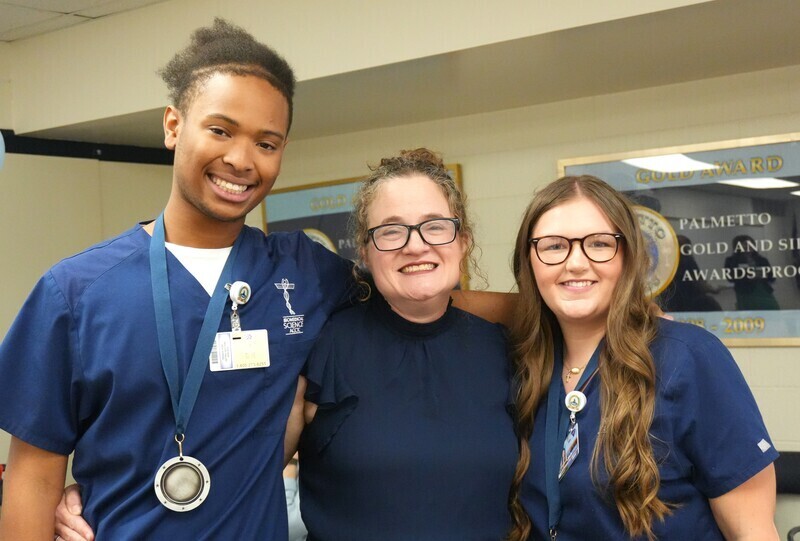 Students posed with Dr. Palladino.
