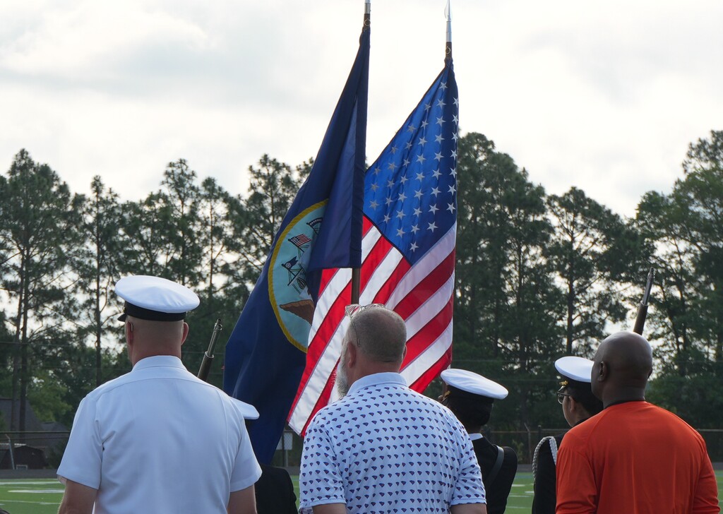 Presenters standing at attention for the presentation of colors at the MVHS Memorial Run.