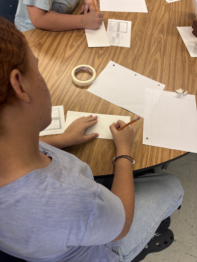Student addressing an envelope.