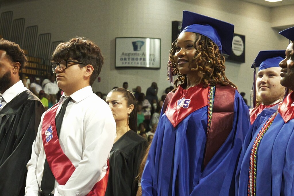 WSHS junior marshall (male) and female graduate. 