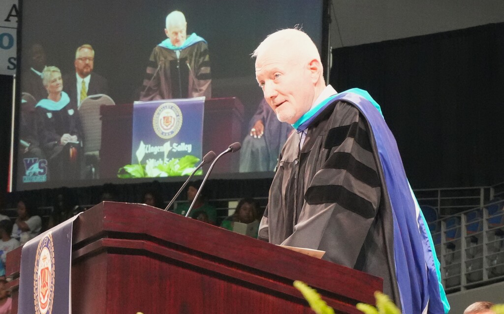 Dr. Tim Yarborough at the podium at graduation. 