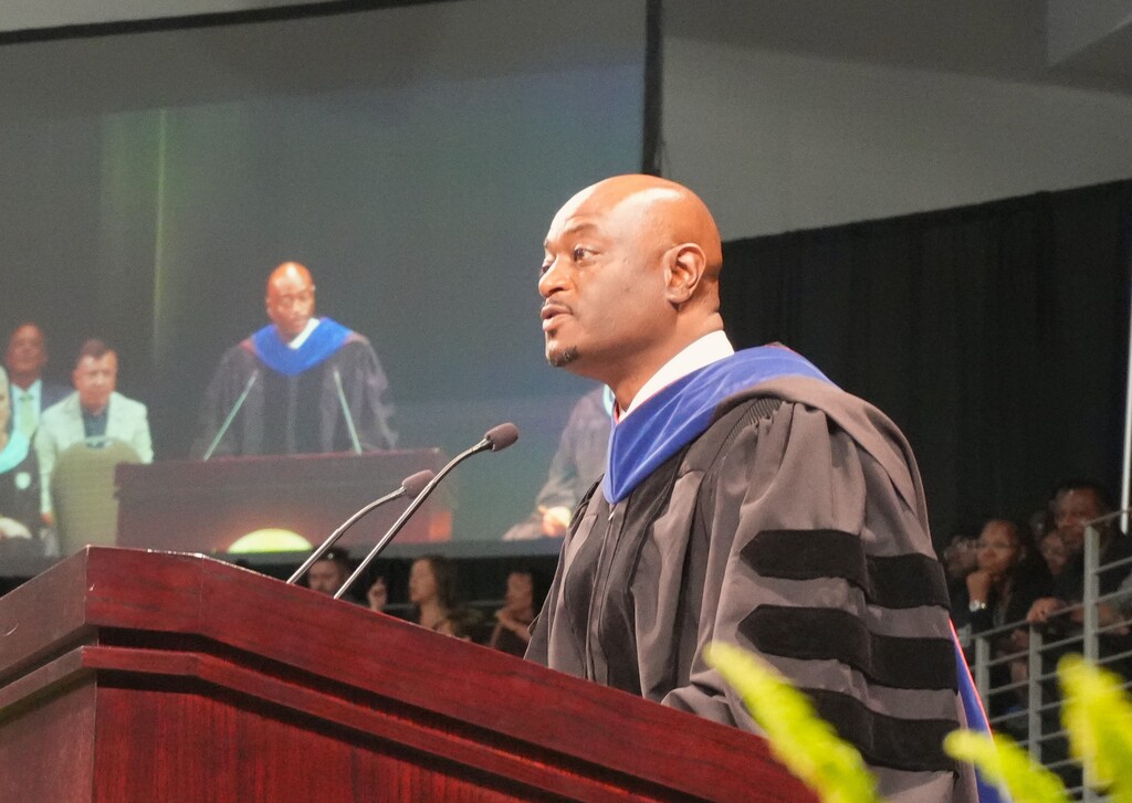Corey Murphy, Superintendent, at the podium. 