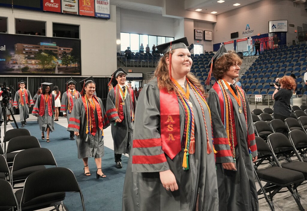 ASA students walking into graduation. 