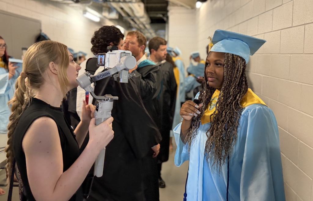 Ridge spring-Monetta graduate being interviewed before graduation.
