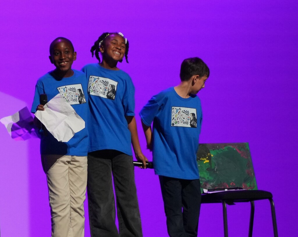 acGATEWAY creative writing students  on stage giving a performance.
