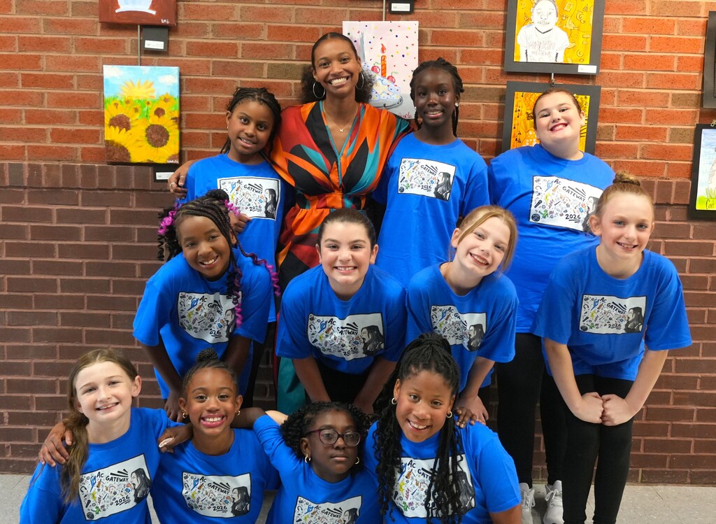 acGATEWAY dance students pose for a picture with their instructor after the show.