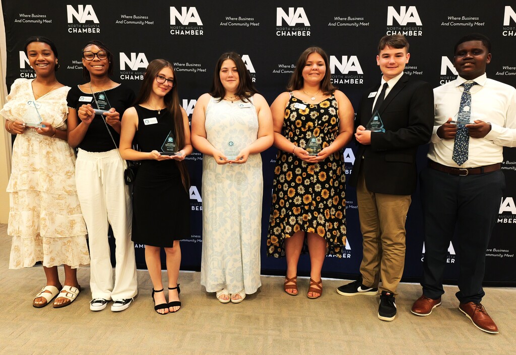 Junior Leadership graduates posing for photo with their award.