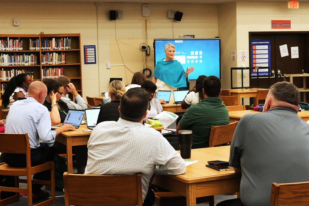 Dr. Amy Edwards leading a professional development meeting.