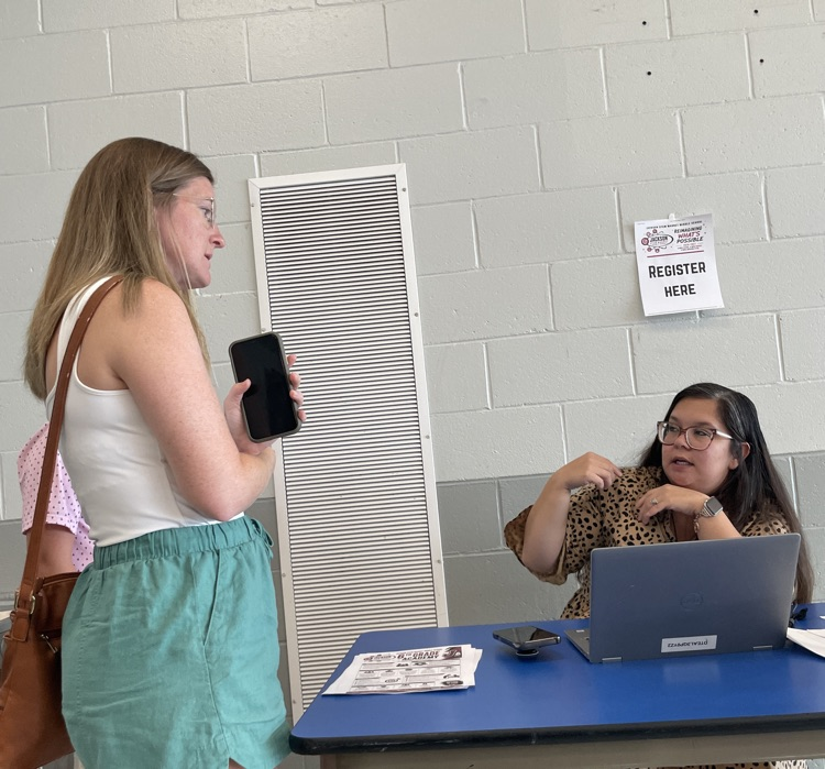 Parent at registration table.