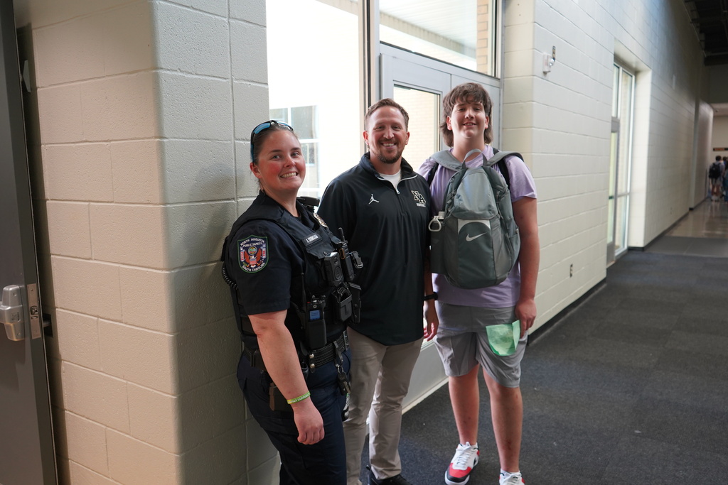 "Boy with male teacher and SRO."