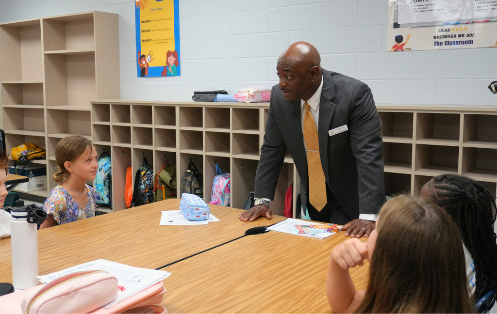 Dr. Corey Murphy chats with elementary students on Day 1.