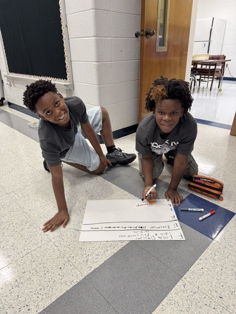 Fifth Grade Students Collaborating 