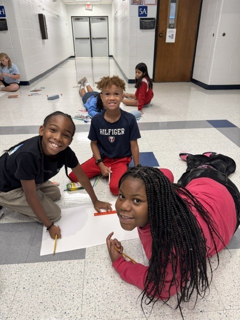 Fifth Grade Students Collaborating 