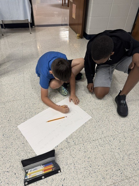 Fifth Grade Students Collaborating 
