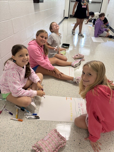 Fifth Grade Students Collaborating 
