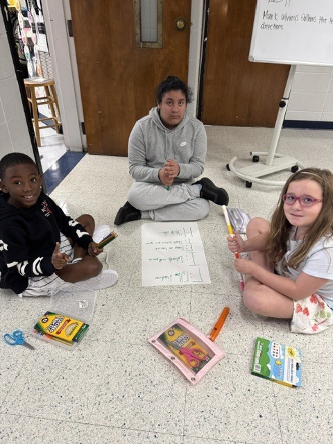 Fifth Grade Students Collaborating 