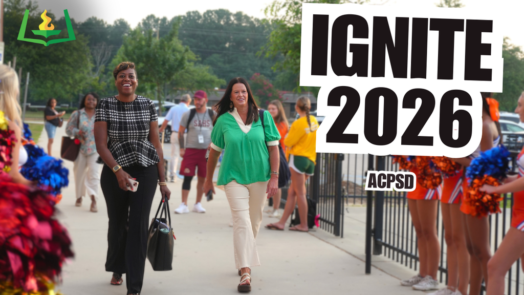 New teachers being greeted by cheerleaders for Ignite 2026.