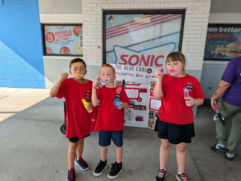 Students enjoying activities at spirit night.