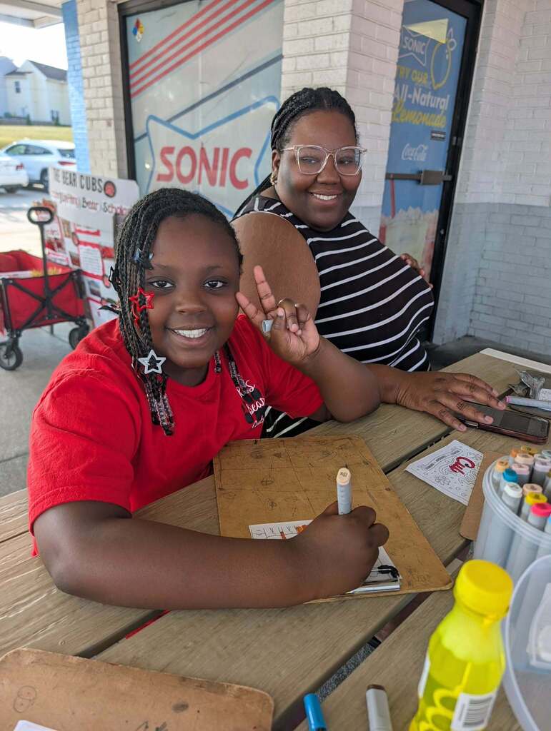 Students enjoying activities at spirit night.