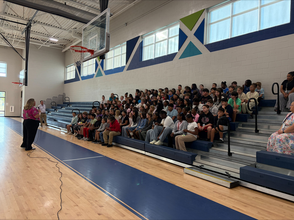 Principal Hadden speaking to 6th grade students