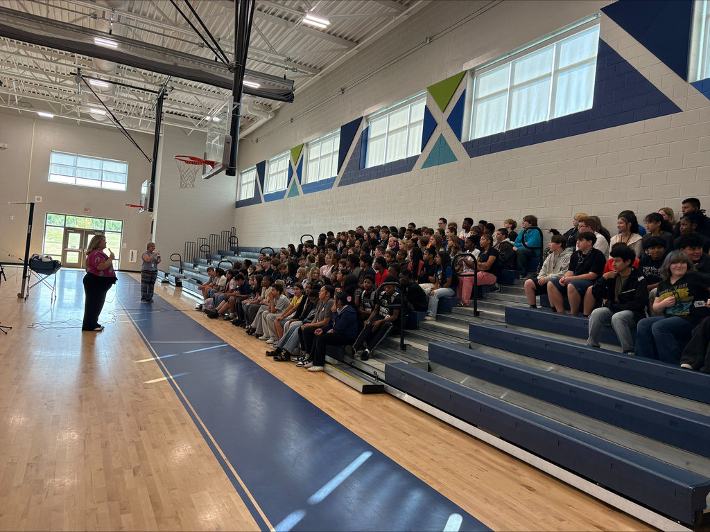 Principal Hadden speaking t0 8th grade students