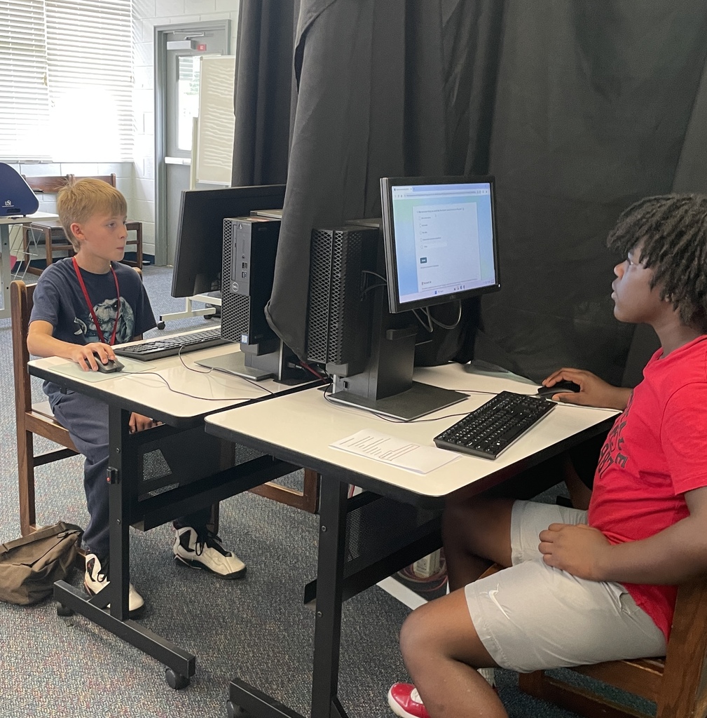 Boys voting for Student Council officers and issues.