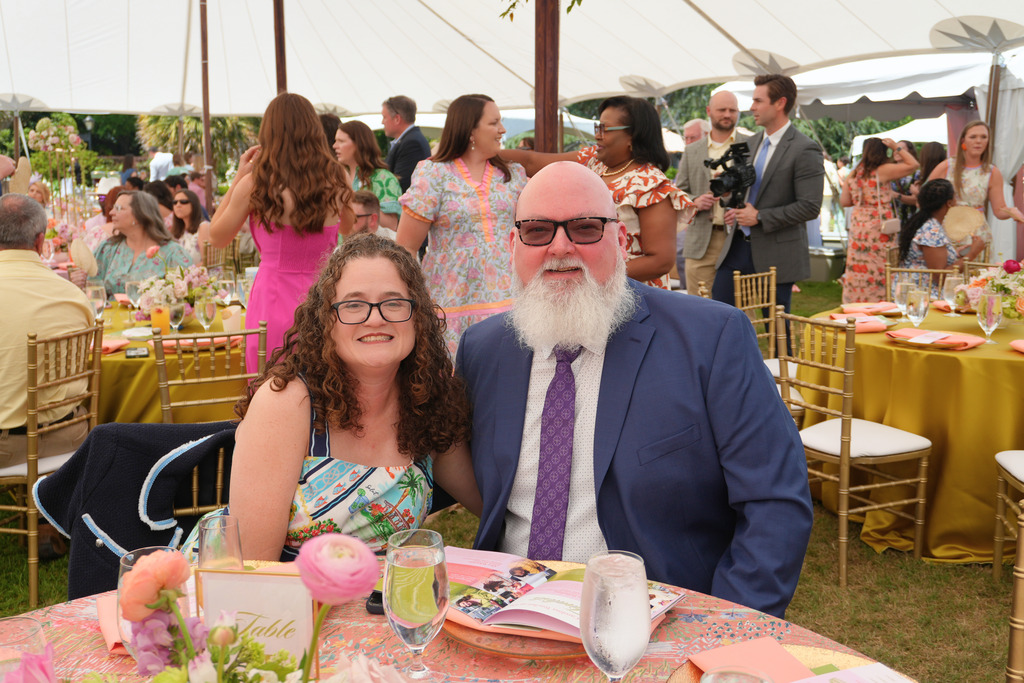 Dr. Palladino and her partner sitting at a table at the Gala.