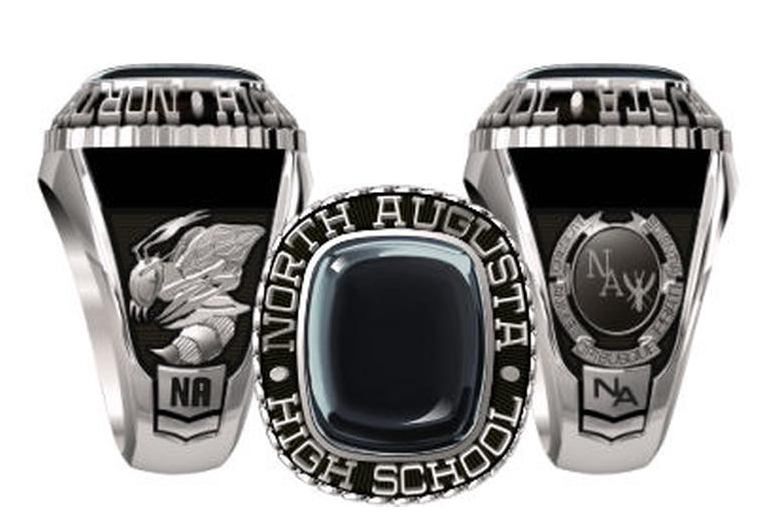 Three silver rings with black and white designs. The middle ring has a black gemstone and "NORTH AUGUSTA HIGH SCHOOL" text.