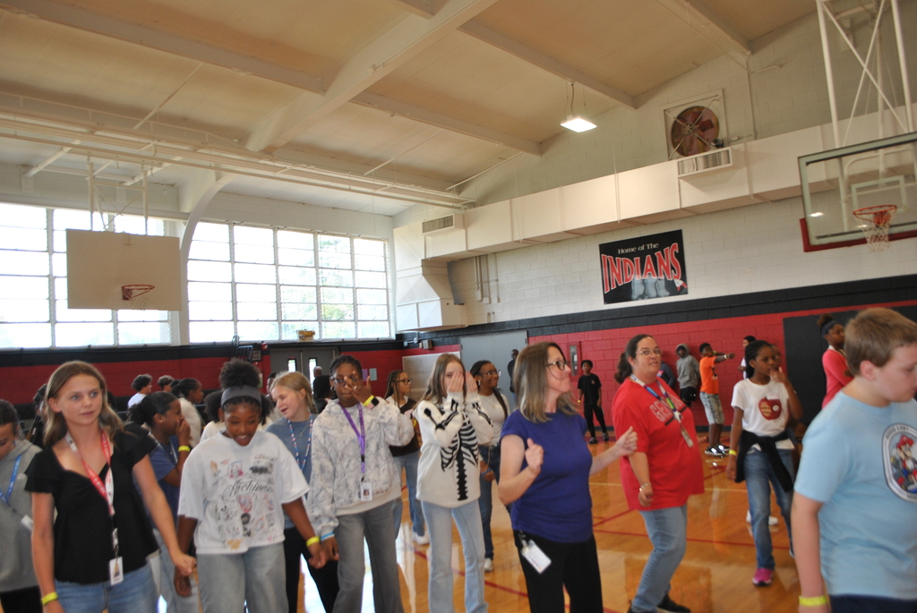 Mrs. Parks and Mrs. O'Quinn busting a move with the scholars.