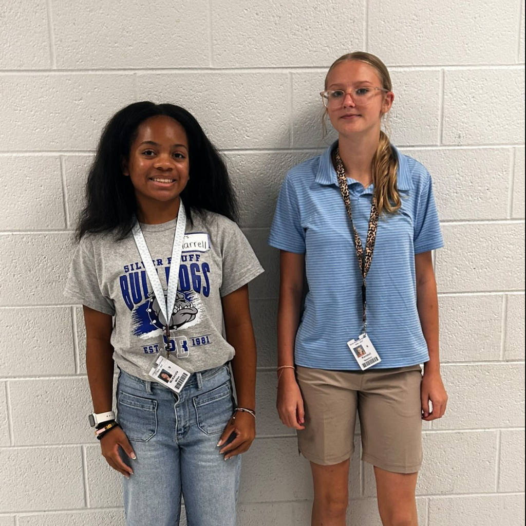 2 students dressed as teachers