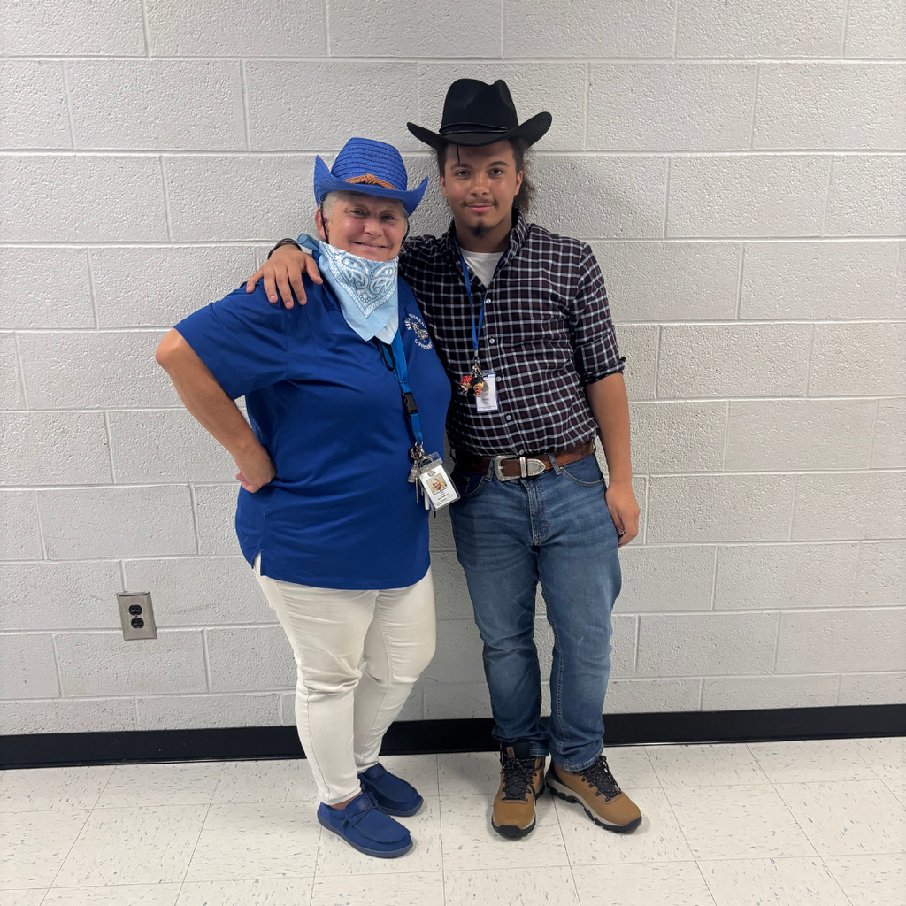 Teacher and student dressed up as cowboys