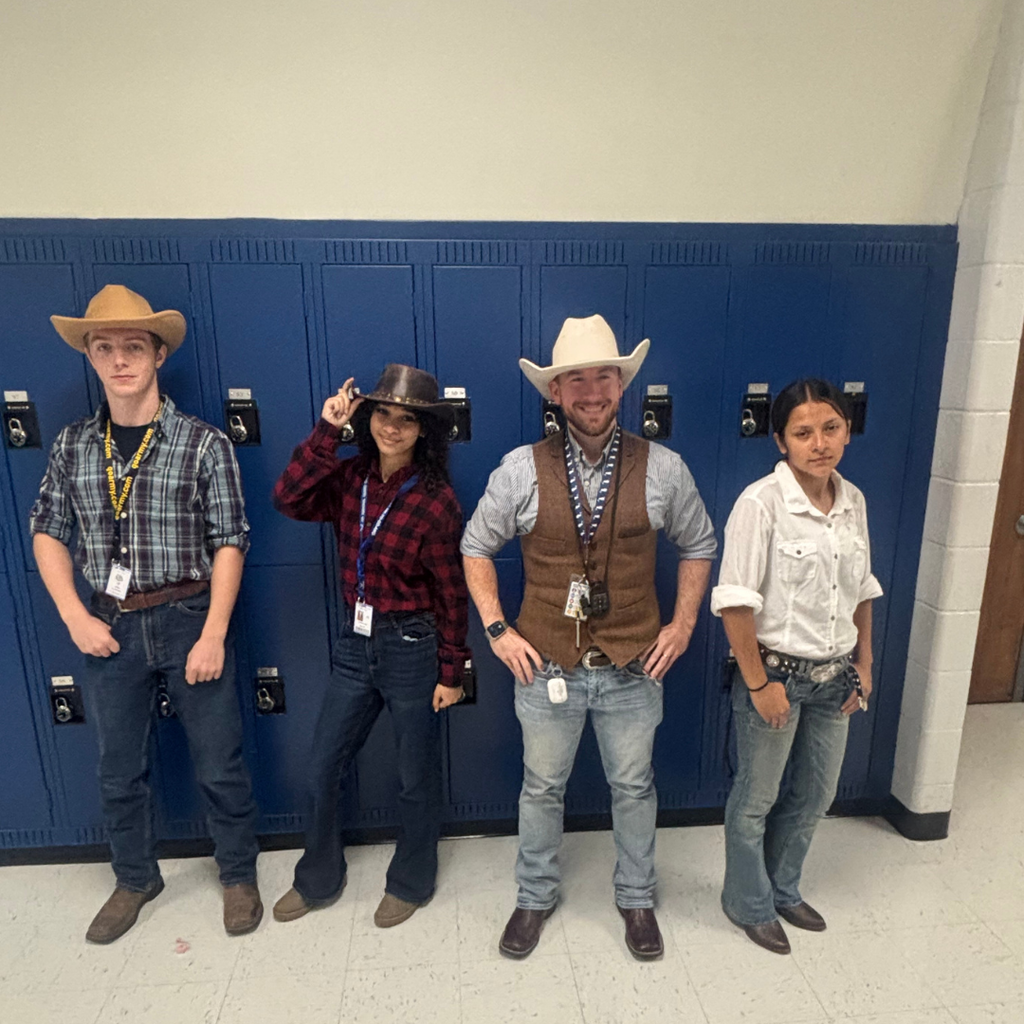 Teacher and students dressed up as cowboys