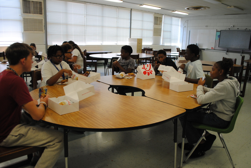 AVID binder and student of the month winners celebrating.