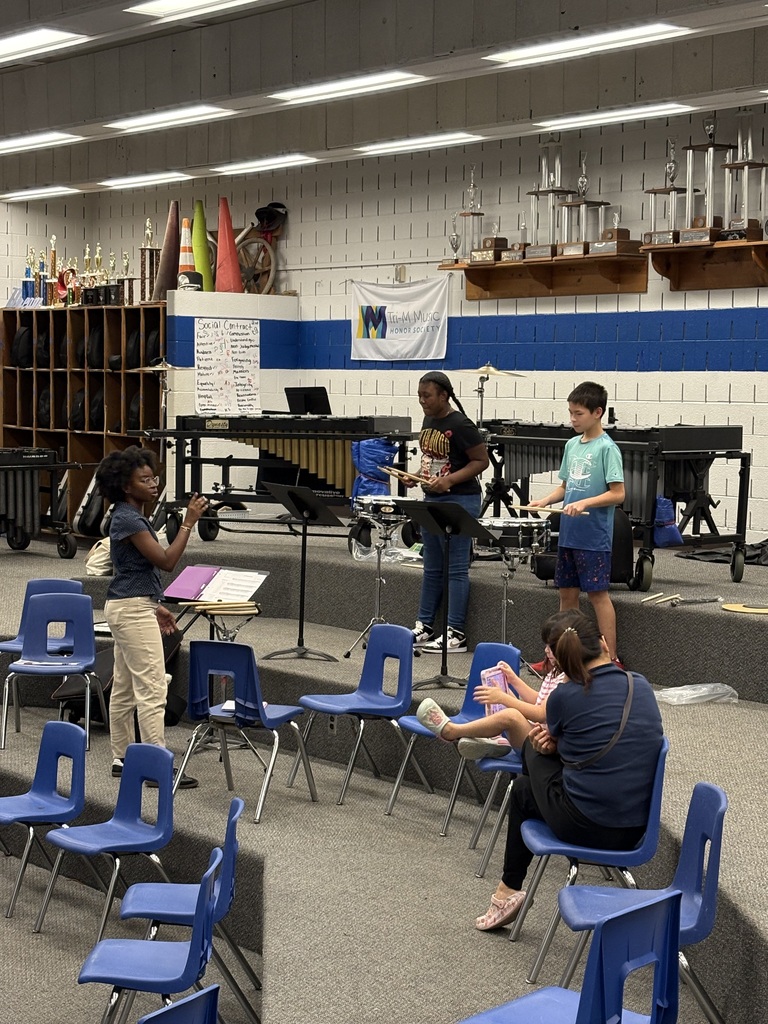 students playing drums