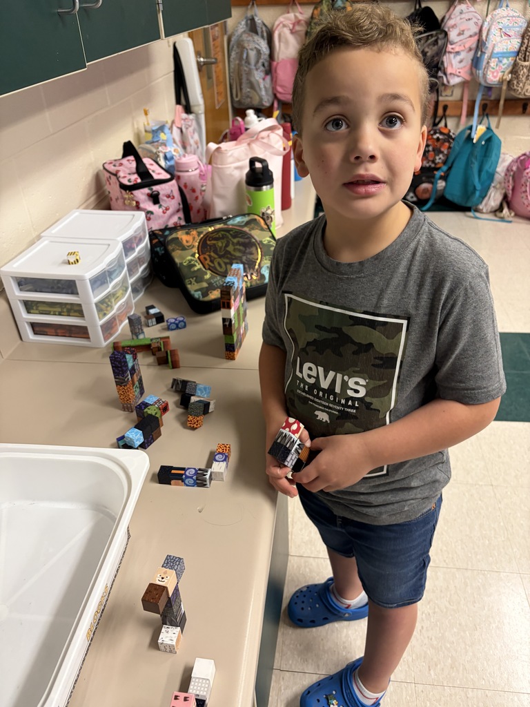 A boy builds with blocks.