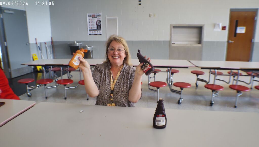 Ms. Smith with the the ice cream syrup. Ready to serve!
