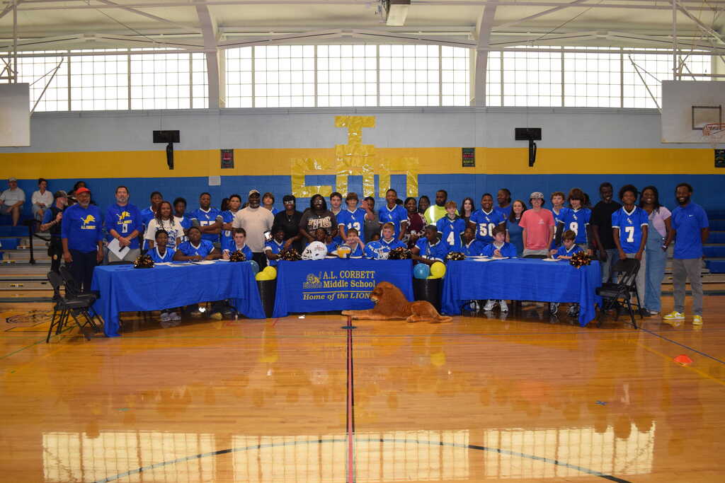 Students and parents at ALCMS Signing Day