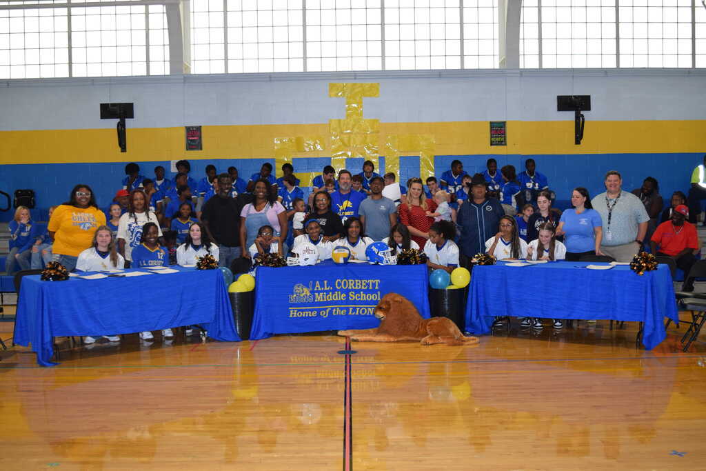 Students and parents at ALCMS Signing Day
