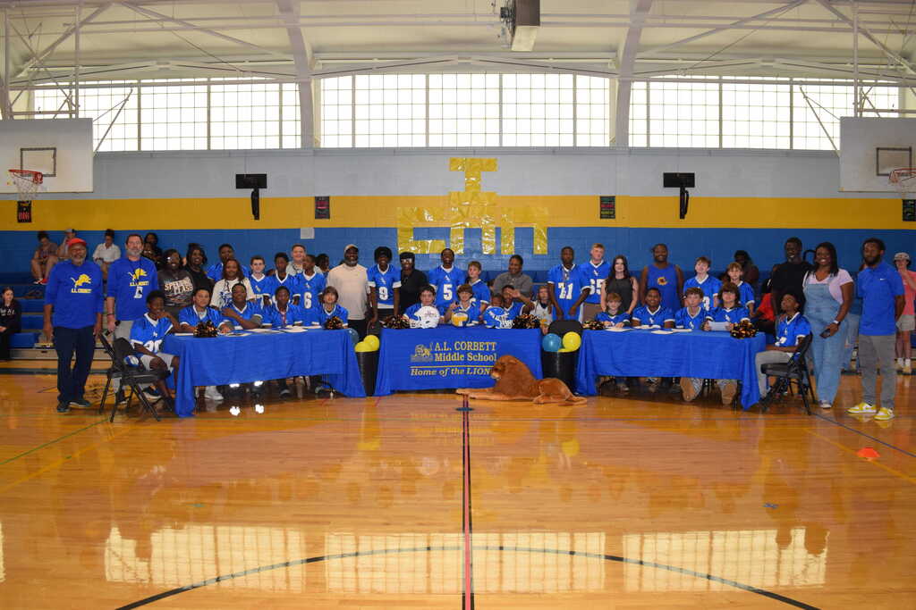 Students and parents at ALCMS Signing Day