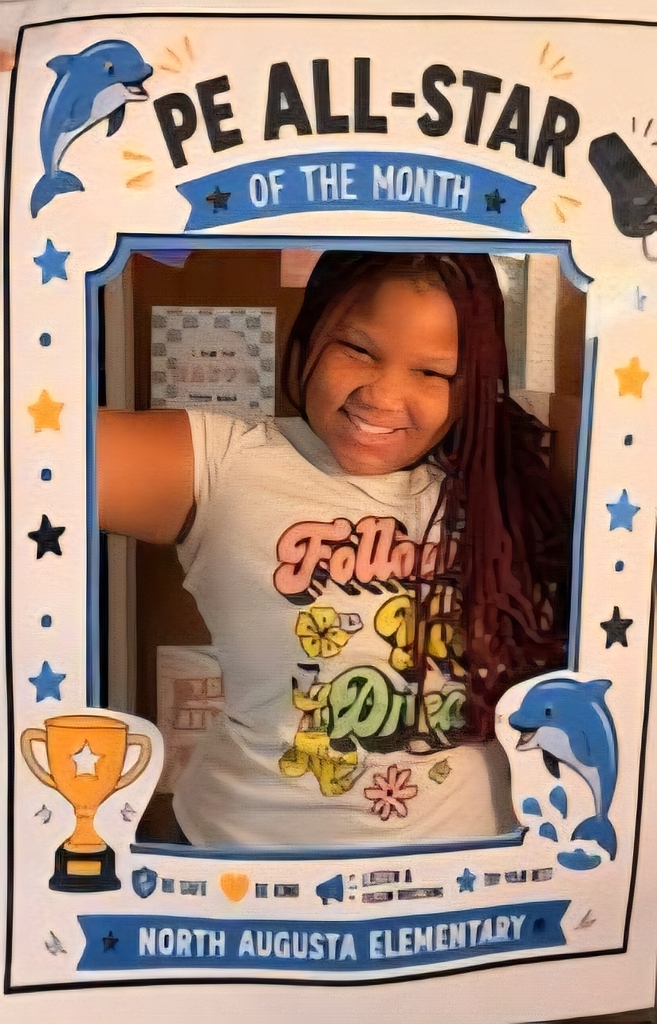 A young person with long hair smiling, inside a photo booth. "PE ALL-STAR OF THE MONTH" is above them.