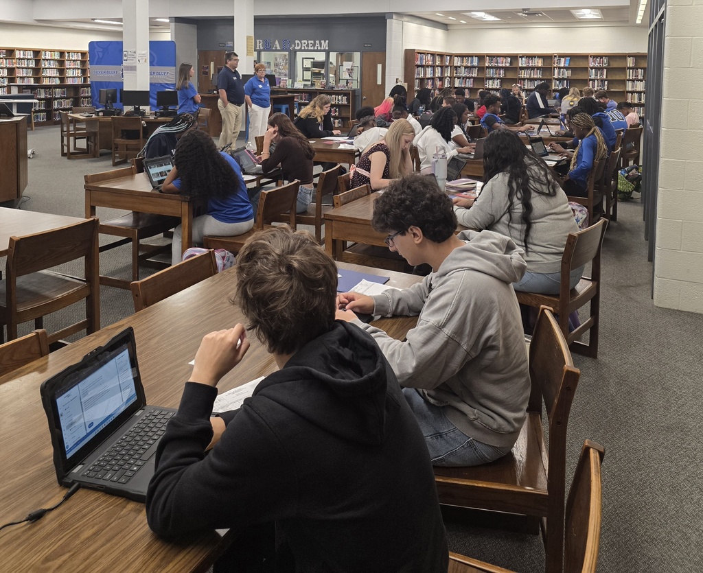 Students working on college applications