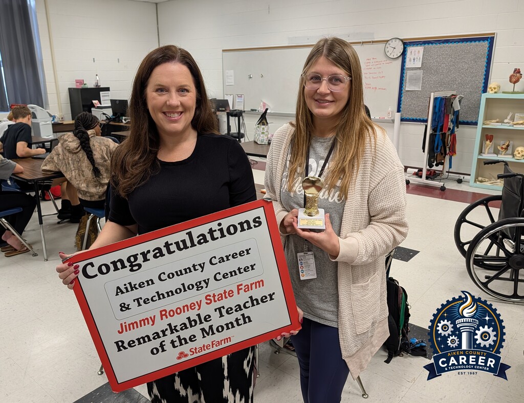 heather hammett receiving state farm remarkable teacher of the month award