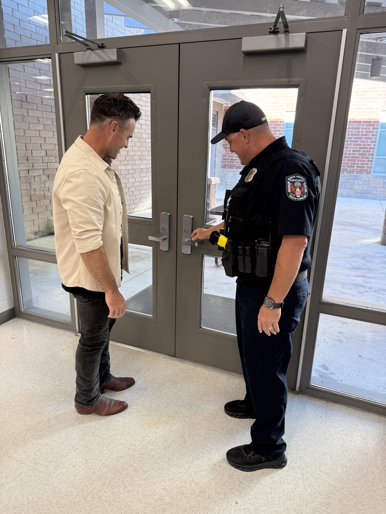 Will Riddle doing safety checks with Officer Gregory