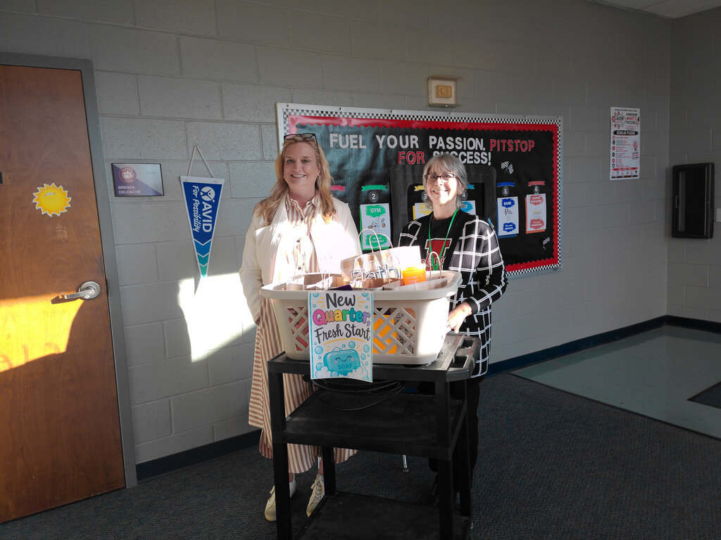 Ms. McElmurray with Ms. DeLoache delivering a fresh start to staff members.