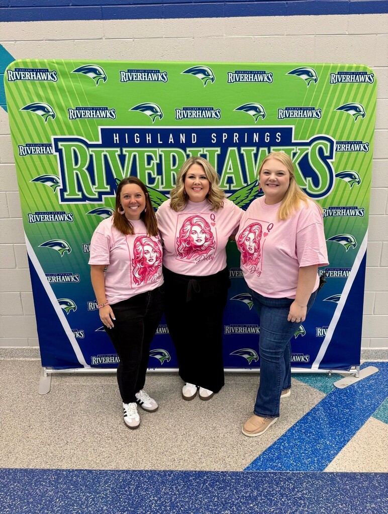 School administrators pose for dolly day picture
