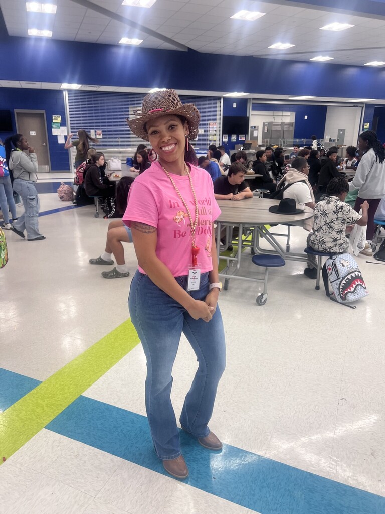 Teacher poses for Dolly dress up day