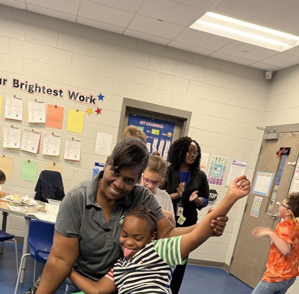 Ms. Sandy with students