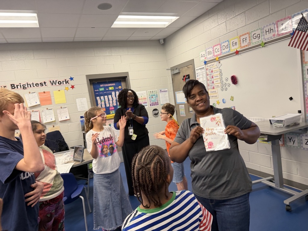 Ms. Sandy with students