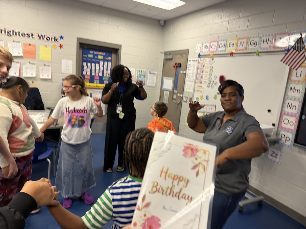 Ms. Sandy with students